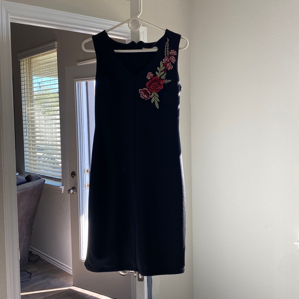 Womens dress. Never worn. Great for work, wedding, event, etc.